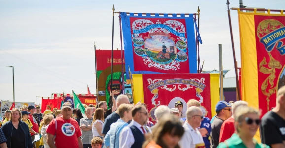 With Banners Held High